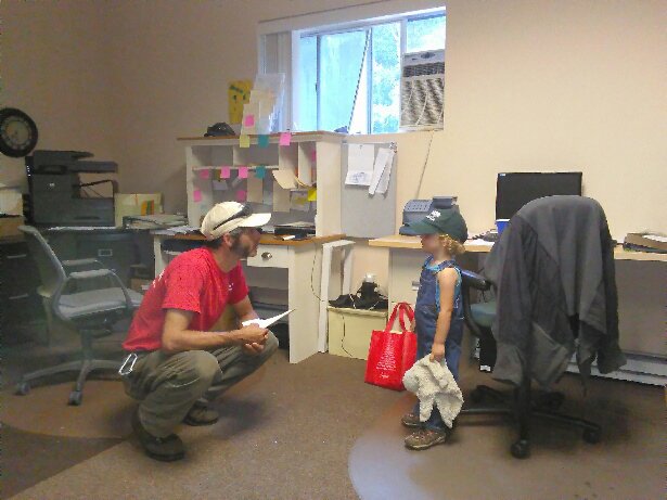 Owner Matt Natti in the office with his daughter, Isabella